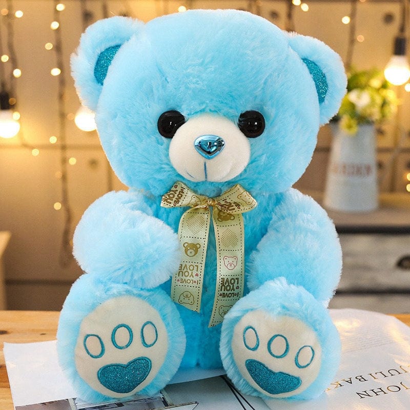 Ours en peluche coloré avec un petit nœud