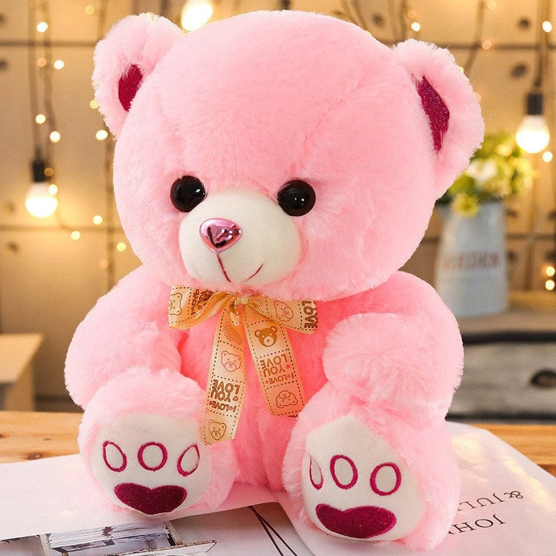 Ours en peluche coloré avec un petit nœud