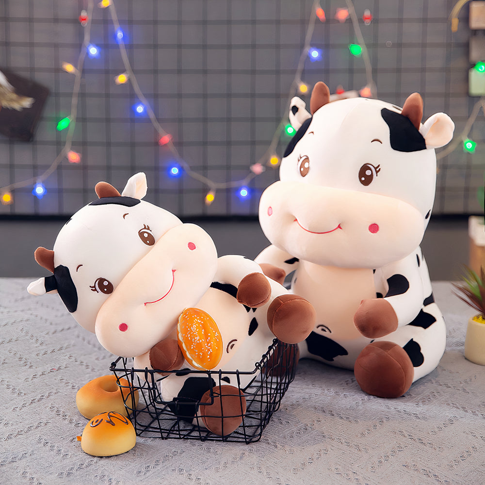 Peluche vache bébé souriant