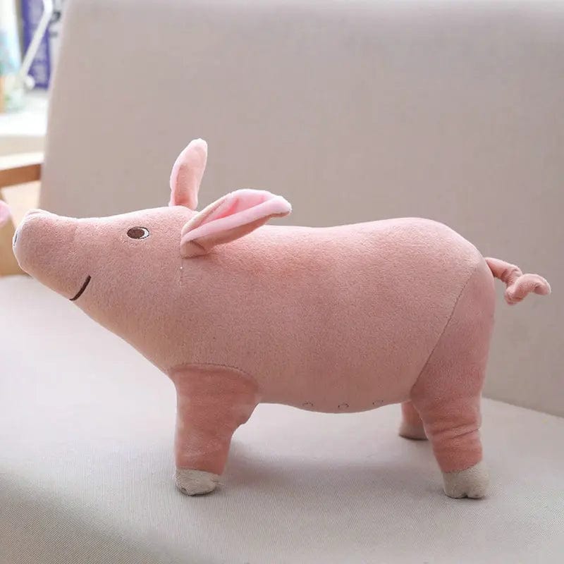 Peluche cochon rose mignon et content