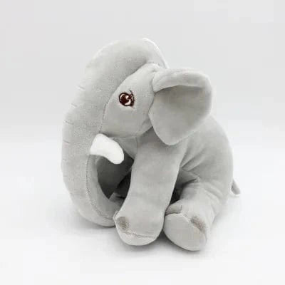 Peluche éléphant assis et content