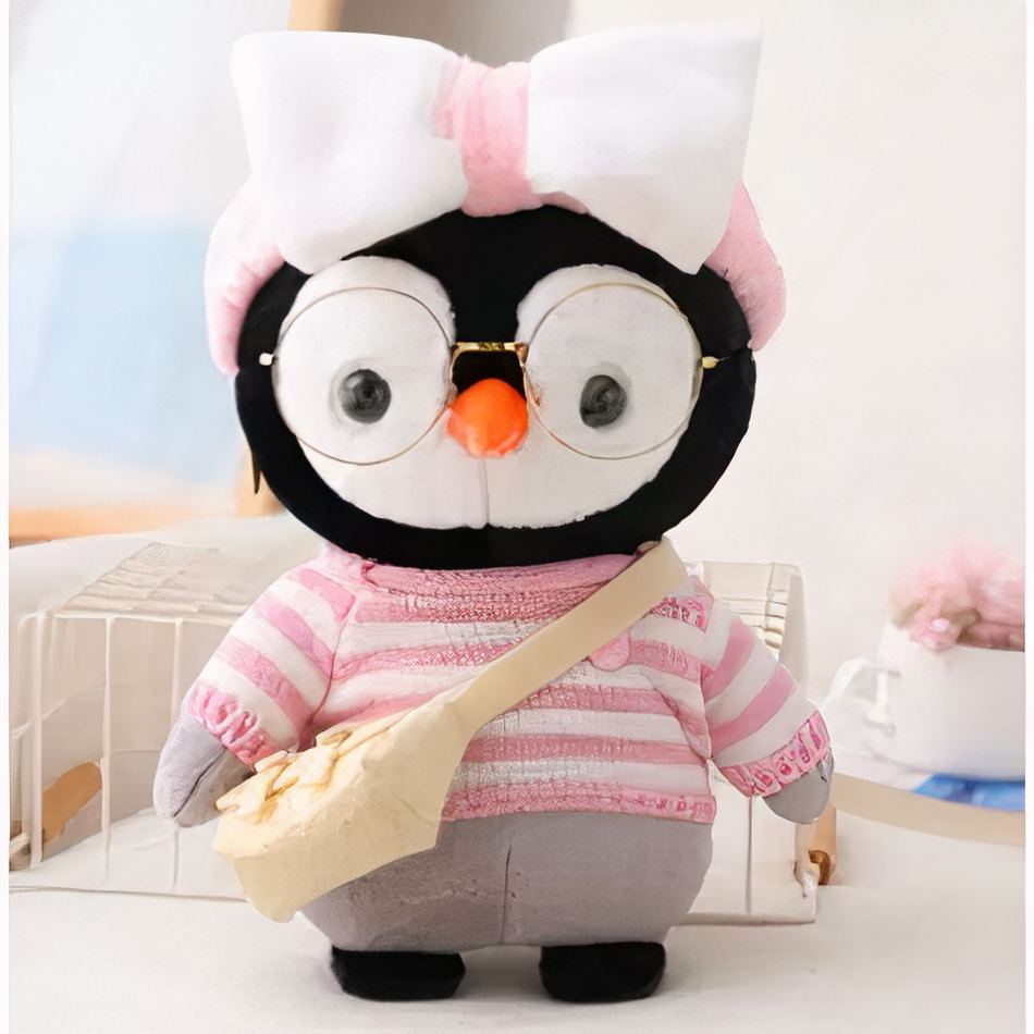 Peluche pingouin hiver doux avec pull rose tricoté