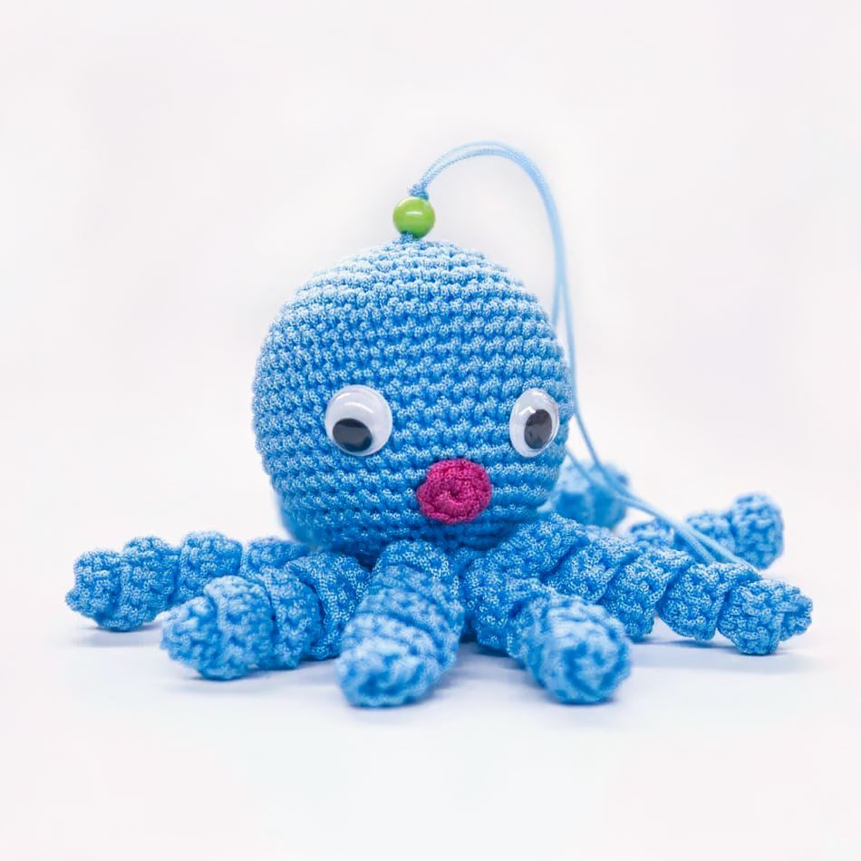 Peluche poulpe bleu enfant doux tressé câlin océan