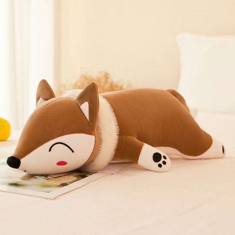 Peluche renard calme et endormi