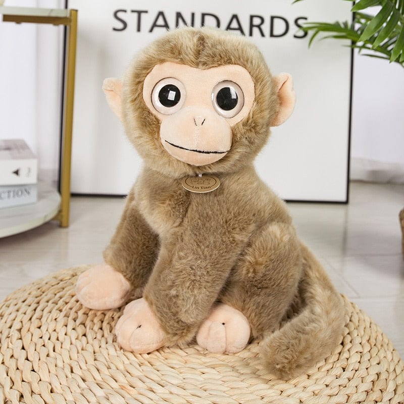 Peluche singe bavard et expressif