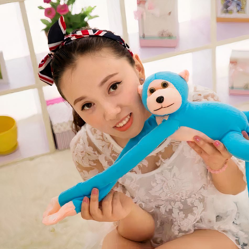 Peluche singe kawaii douce longue queue bleue câline