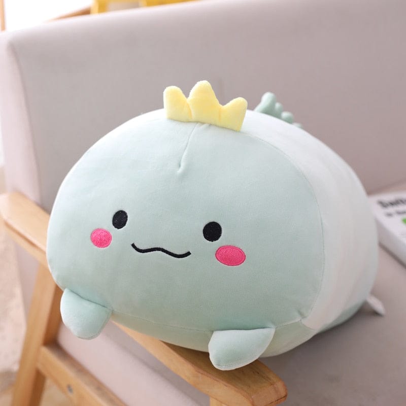 Peluche squishmallow dinosaure couronné