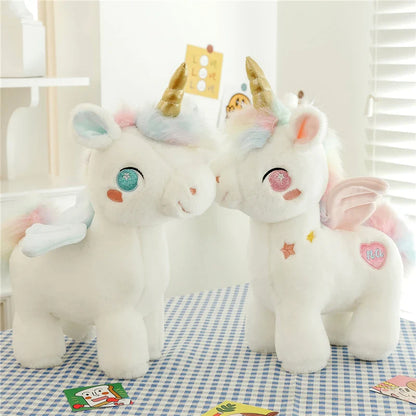 Peluche licorne blanche étoilée avec ailes et corne dorée