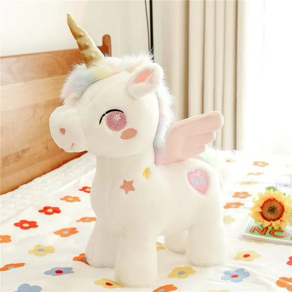 Peluche licorne blanche étoilée avec ailes et corne dorée