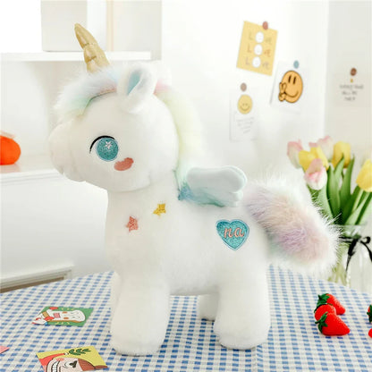 Peluche licorne blanche étoilée avec ailes et corne dorée