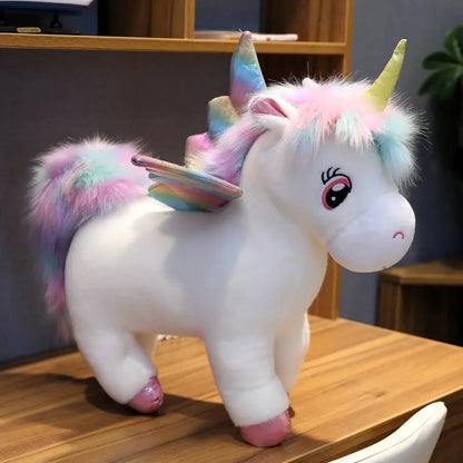 Peluche licorne arc-en-ciel blanche avec ailes et corne dorée