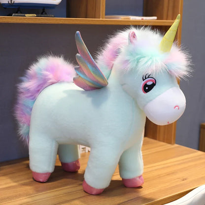 Peluche licorne arc-en-ciel bleu avec ailes et corne dorée