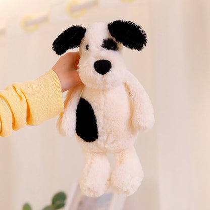 Peluche chien blanc avec un œil noir