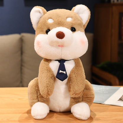 Peluche chien shiba avec un cravate os