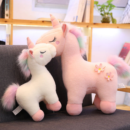 Peluche licorne blanche fleurie avec crinière arc-en-ciel
