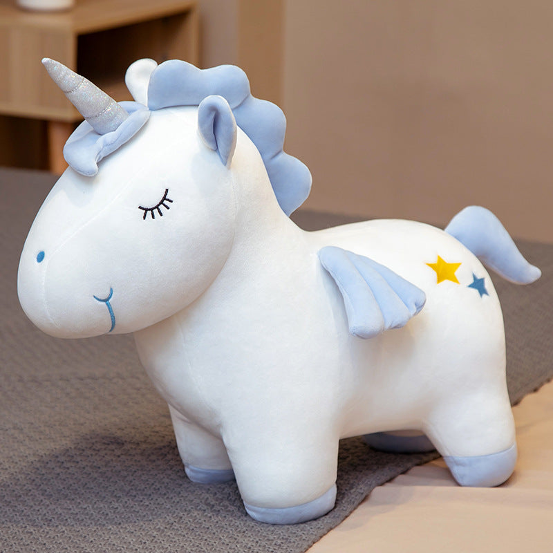 Peluche licorne coloré aux yeux fermés avec cornet argenté magiques