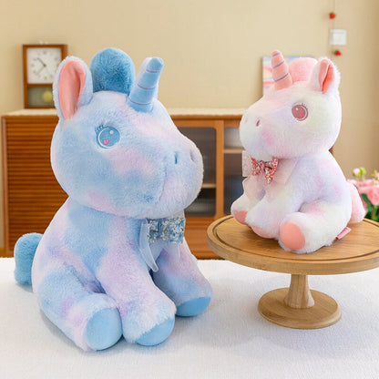 Peluche licorne douce pastel et arc en ciel