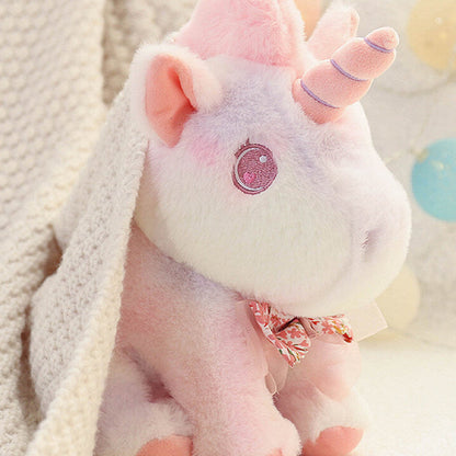 Peluche licorne douce pastel et arc en ciel