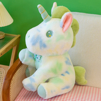 Peluche licorne douce pastel et arc en ciel