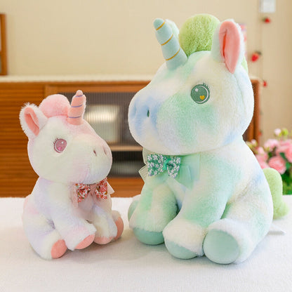 Peluche licorne douce pastel et arc en ciel