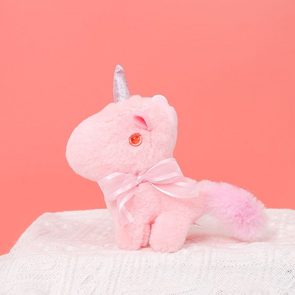Peluche licorne miniature douce avec nœud et cornet pailleté