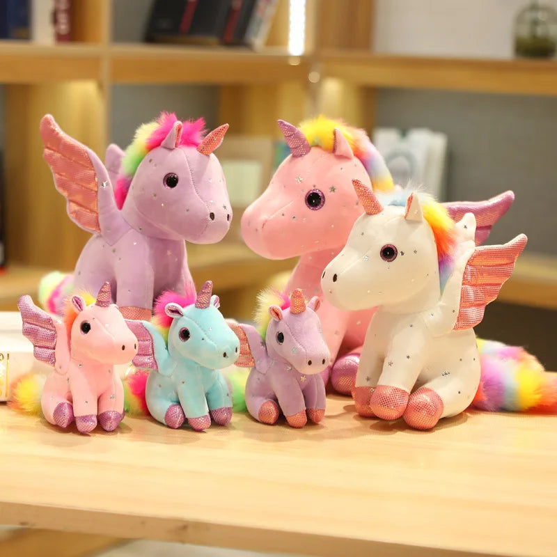 Peluche licorne blanche à crinière arc-en-ciel magique