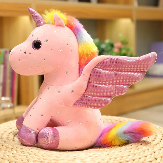 Peluche licorne rose à crinière arc-en-ciel magique