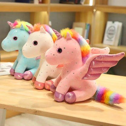 Peluche licorne blanche à crinière arc-en-ciel magique