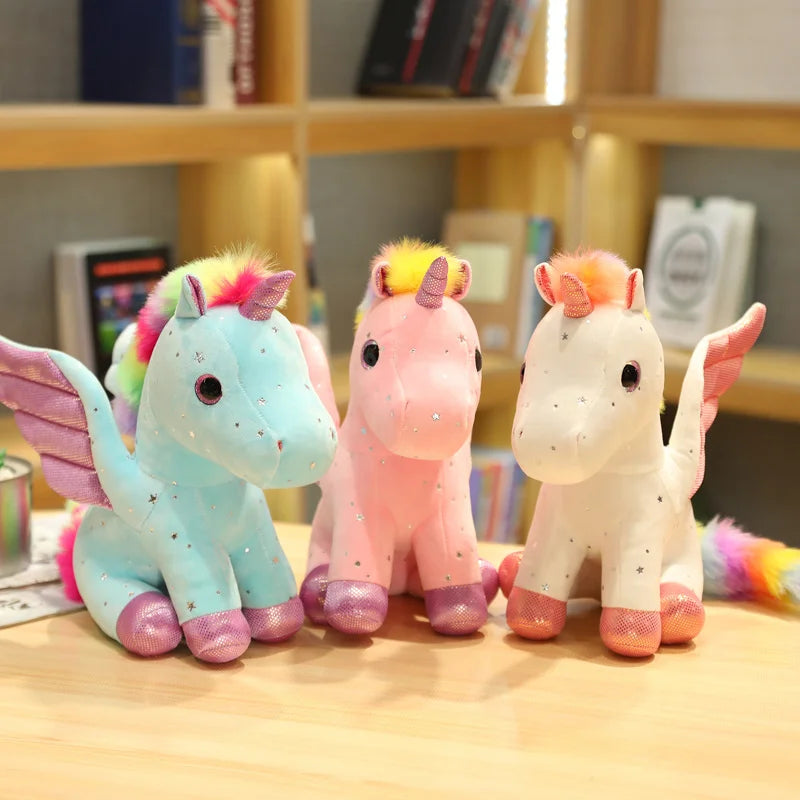 Peluche licorne blanche à crinière arc-en-ciel magique
