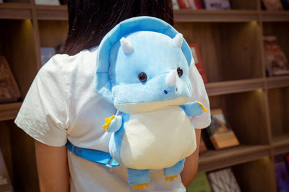 Le bébé dinosaure - sac à dos en peluche