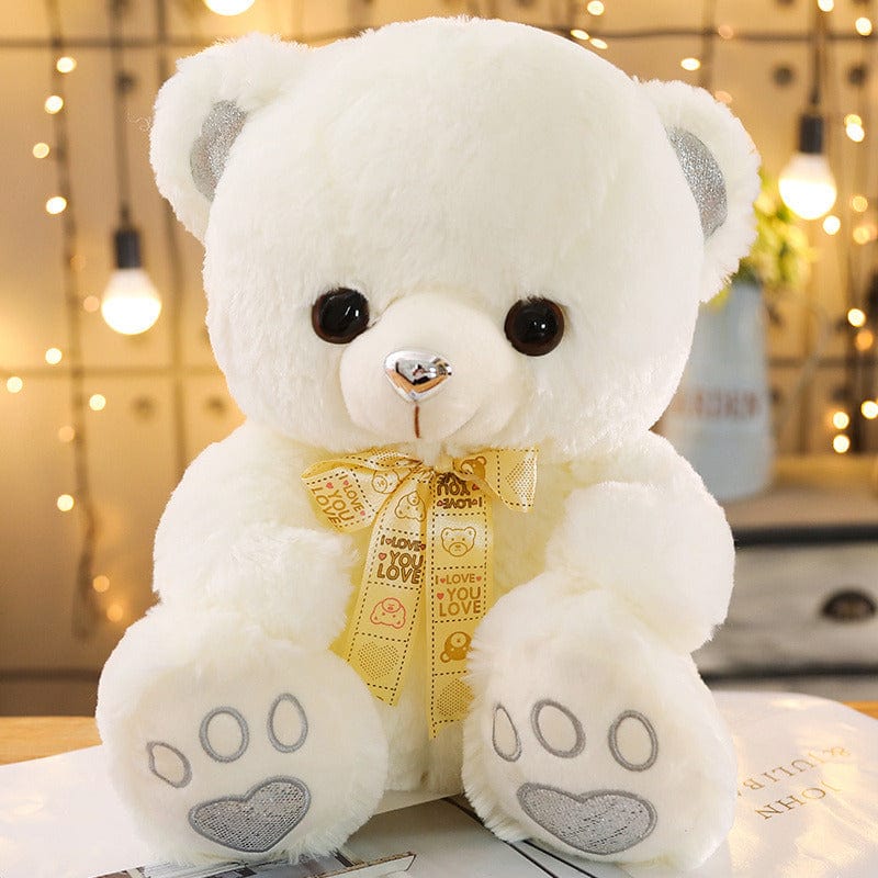 Ours en peluche coloré avec un petit nœud