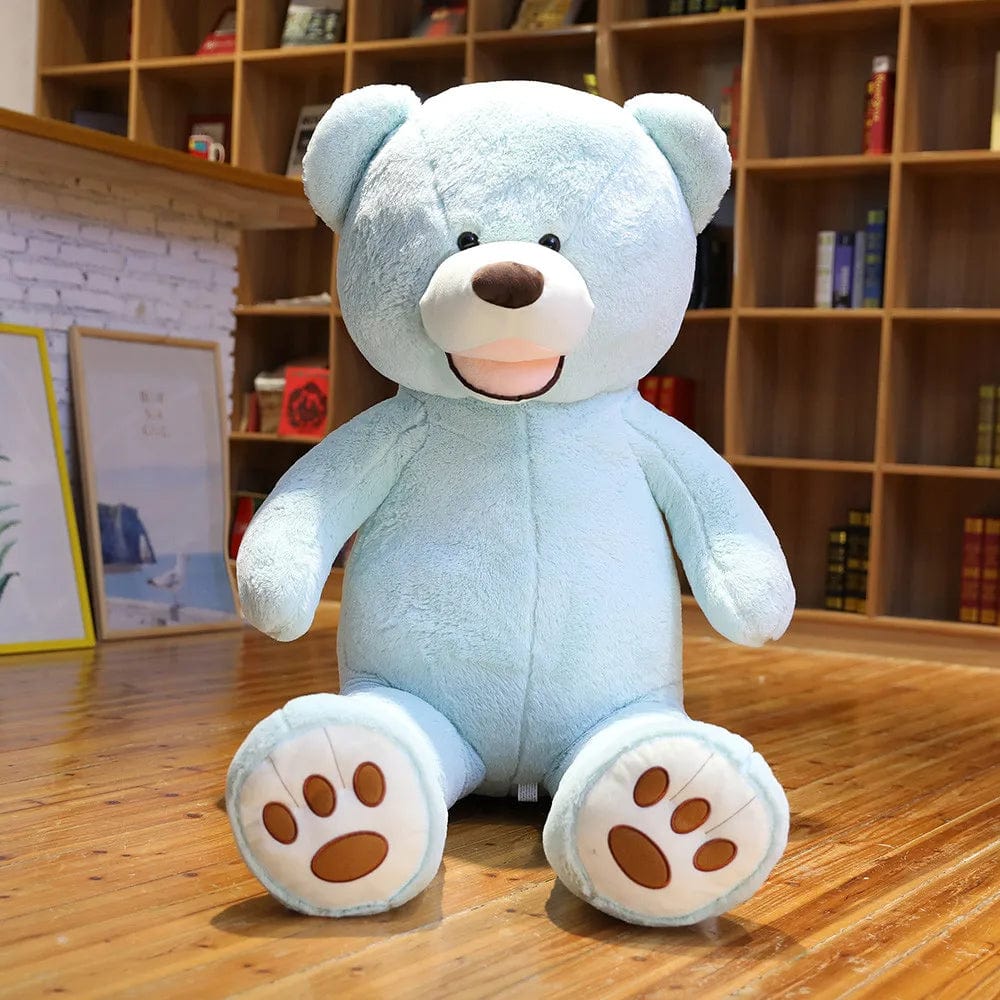 Ours en peluche géant coloré et souriant