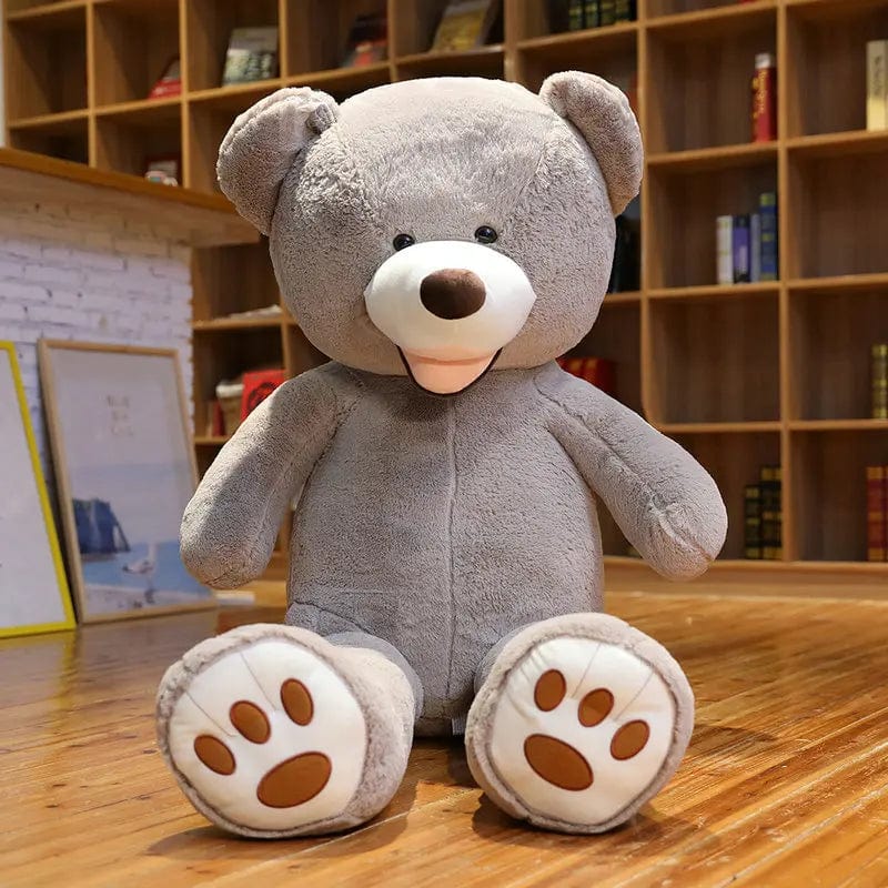 Ours en peluche géant coloré et souriant