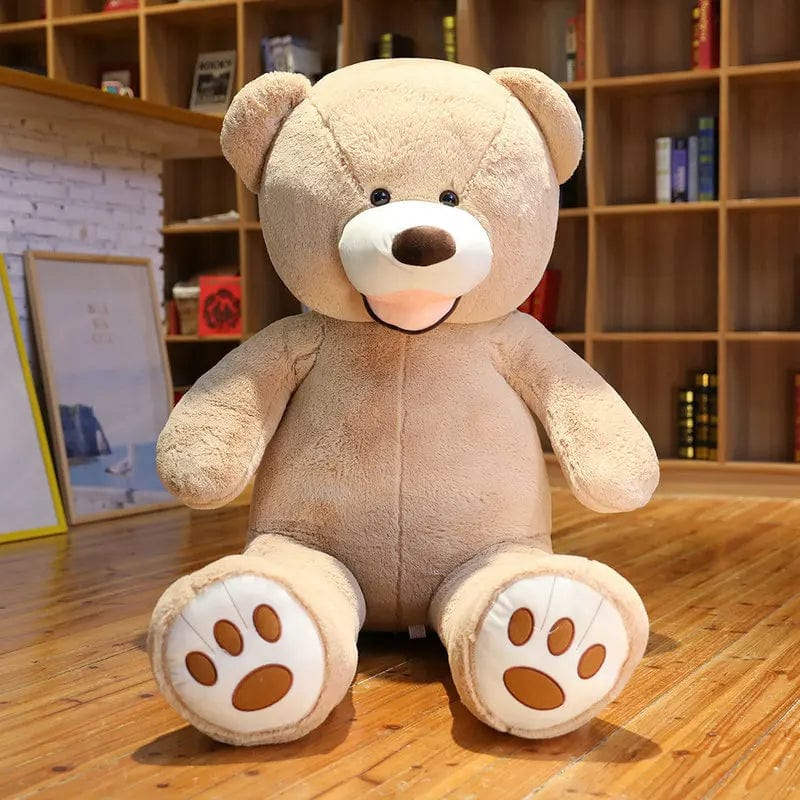 Ours en peluche géant coloré et souriant