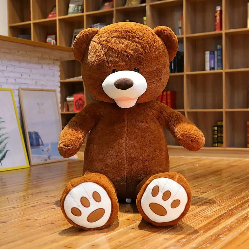 Ours en peluche géant coloré et souriant