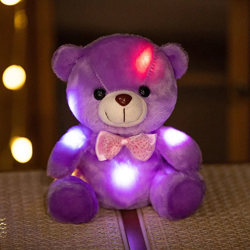 Ours en peluche lumineux avec un nœud de papillon