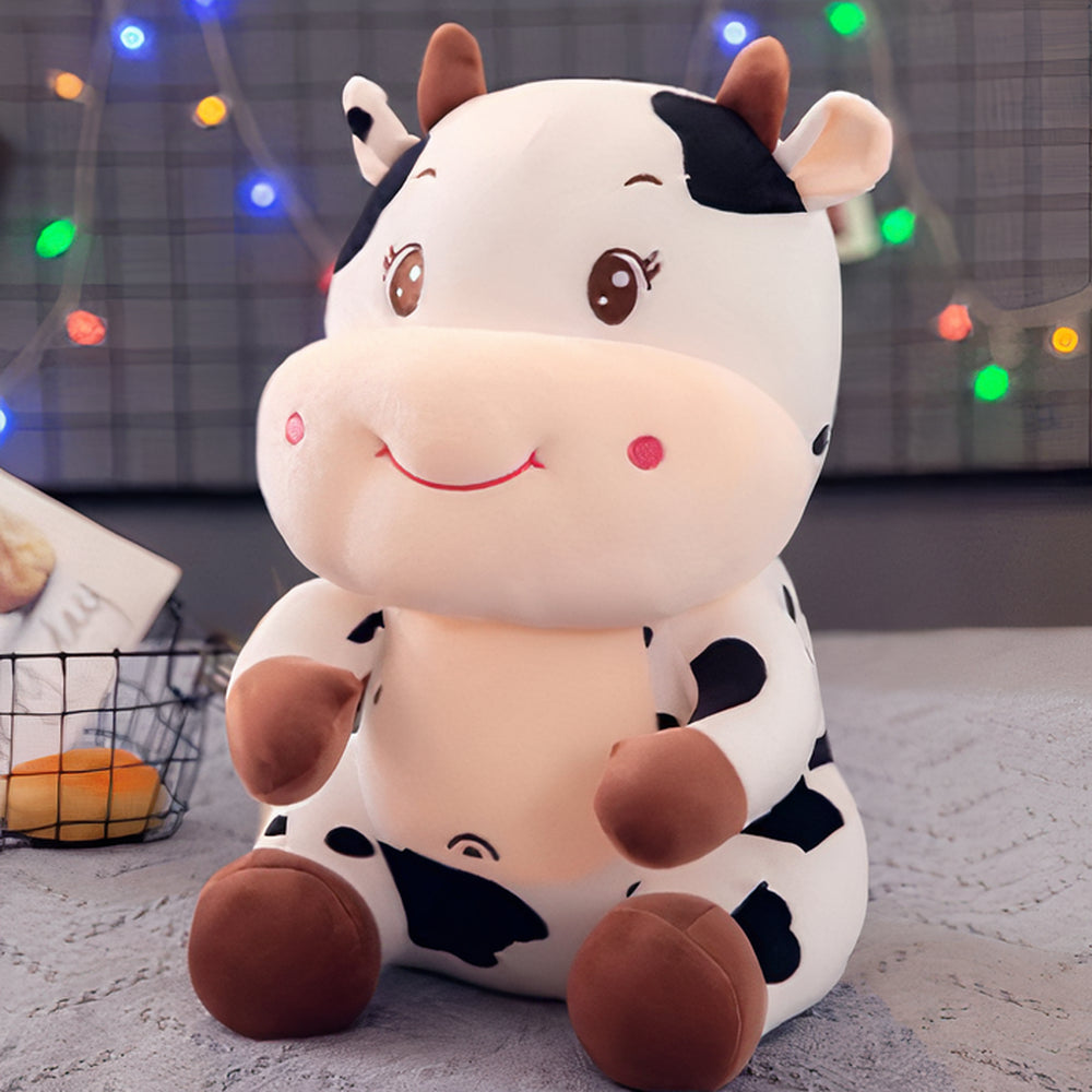 Peluche vache bébé souriant