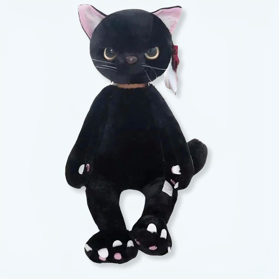 Peluche chat noir assis mécontent doux et câlin