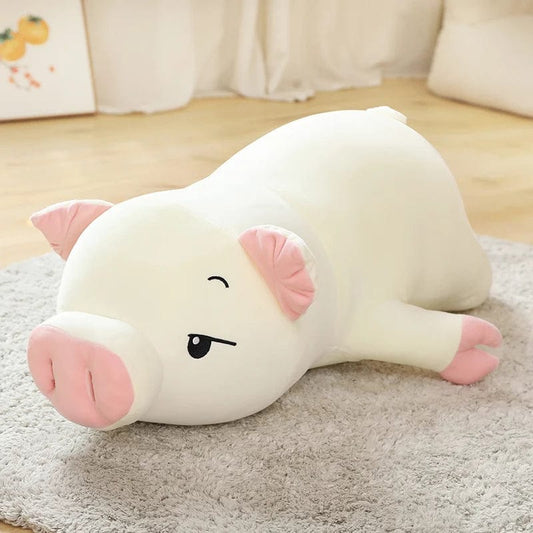 Peluche cochon allongé endormi