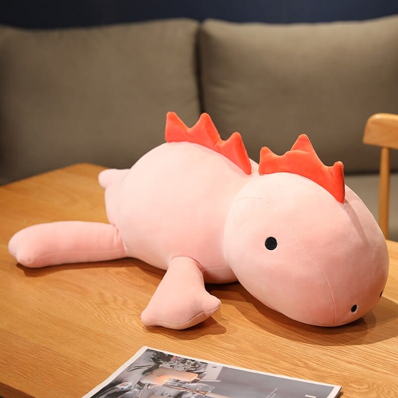 Peluche dinosaure avec crinière et cornes