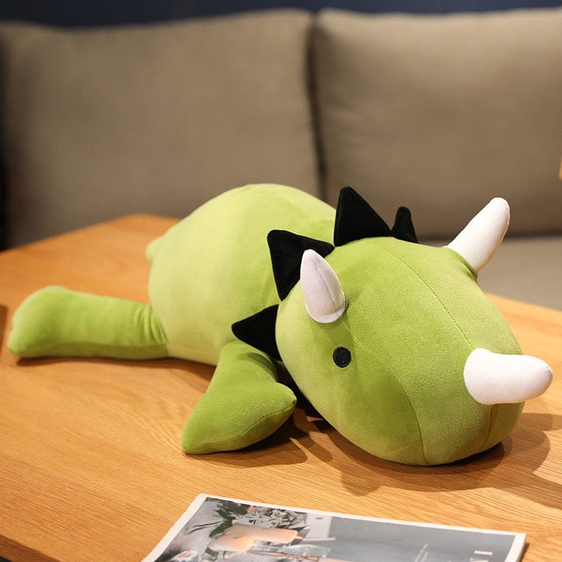 Peluche dinosaure avec crinière et cornes