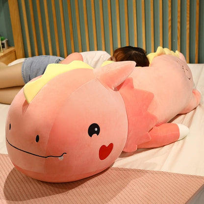 Peluche dinosaure avec un cœur sur la joue