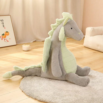Peluche dragon doux assis