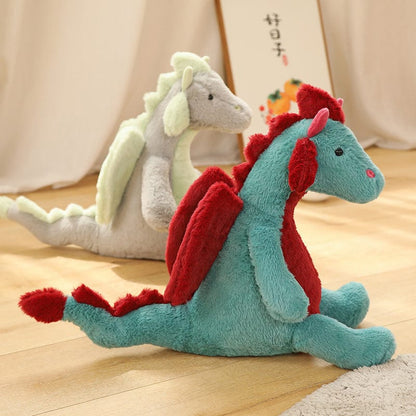 Peluche dragon doux assis