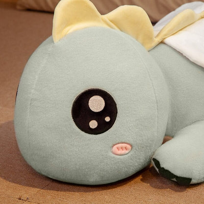 Peluche dragon géant aux gros yeux