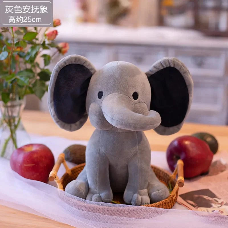 Peluche éléphant coloré avec sa trompe tordue