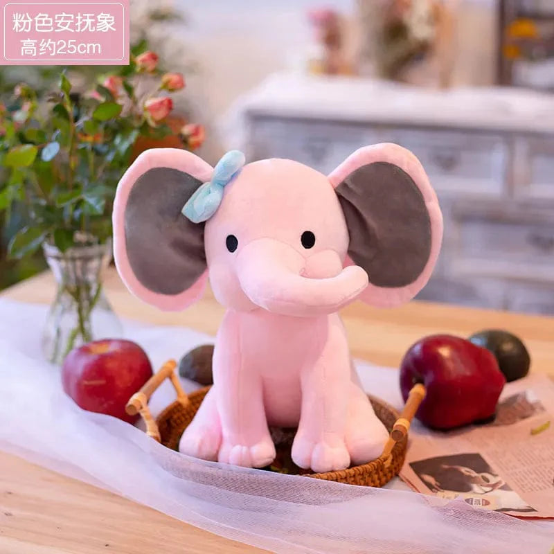 Peluche éléphant coloré avec sa trompe tordue