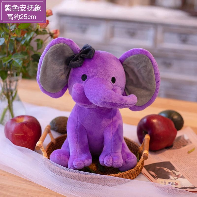 Peluche éléphant coloré avec sa trompe tordue