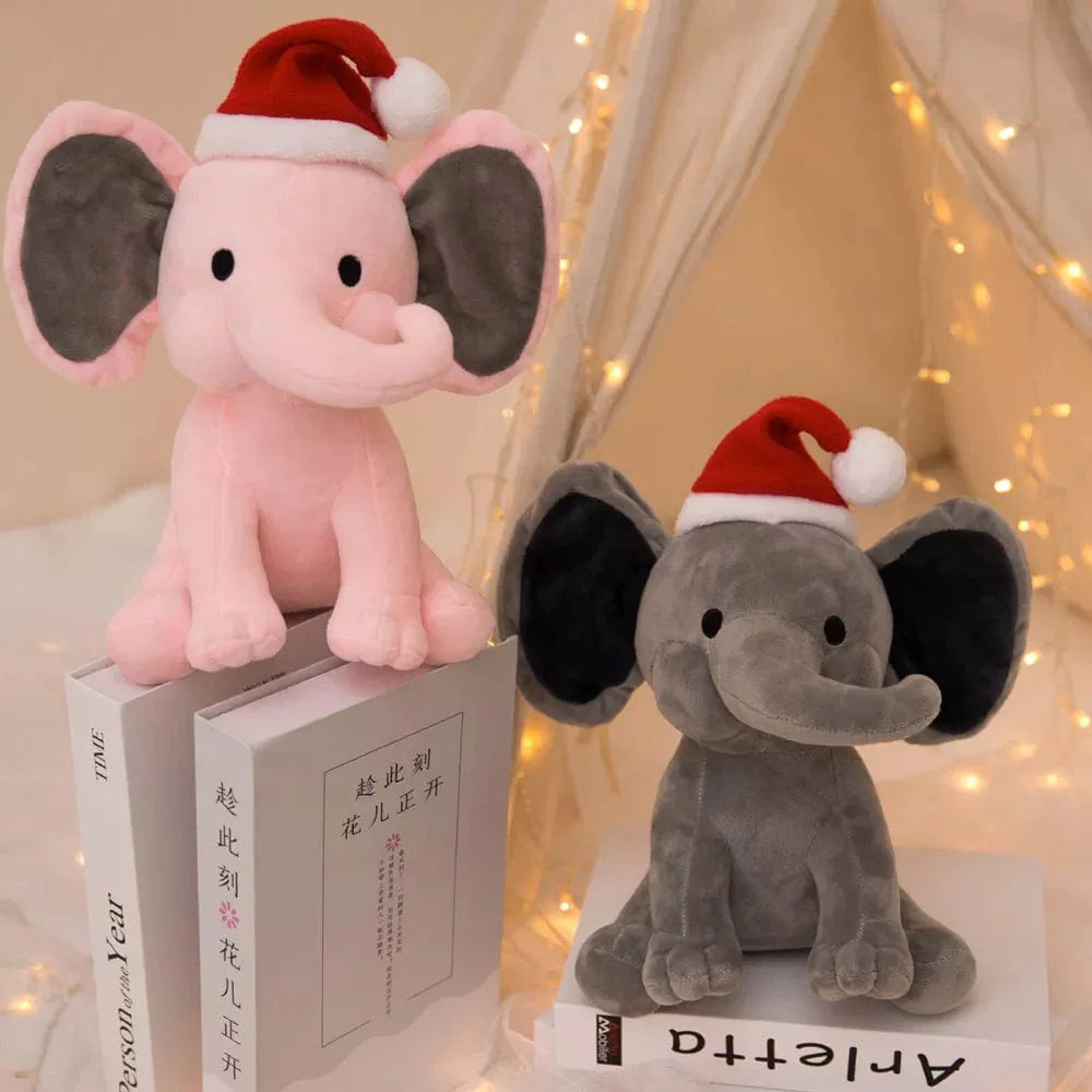 Peluche éléphant de noël avec sa trompe tordue
