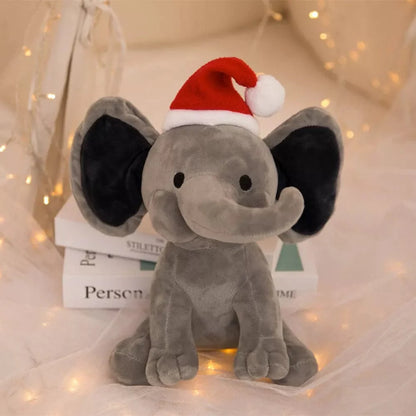 Peluche éléphant de noël avec sa trompe tordue